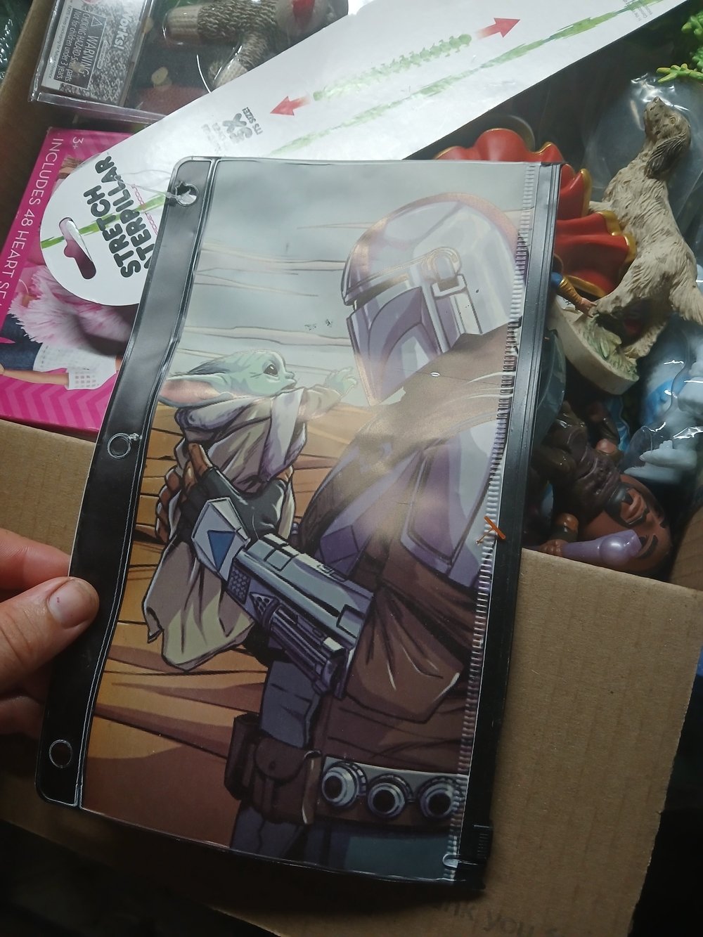 plastic 3-ring binder pencil pouch decorated with graphic art of The Mandalorian